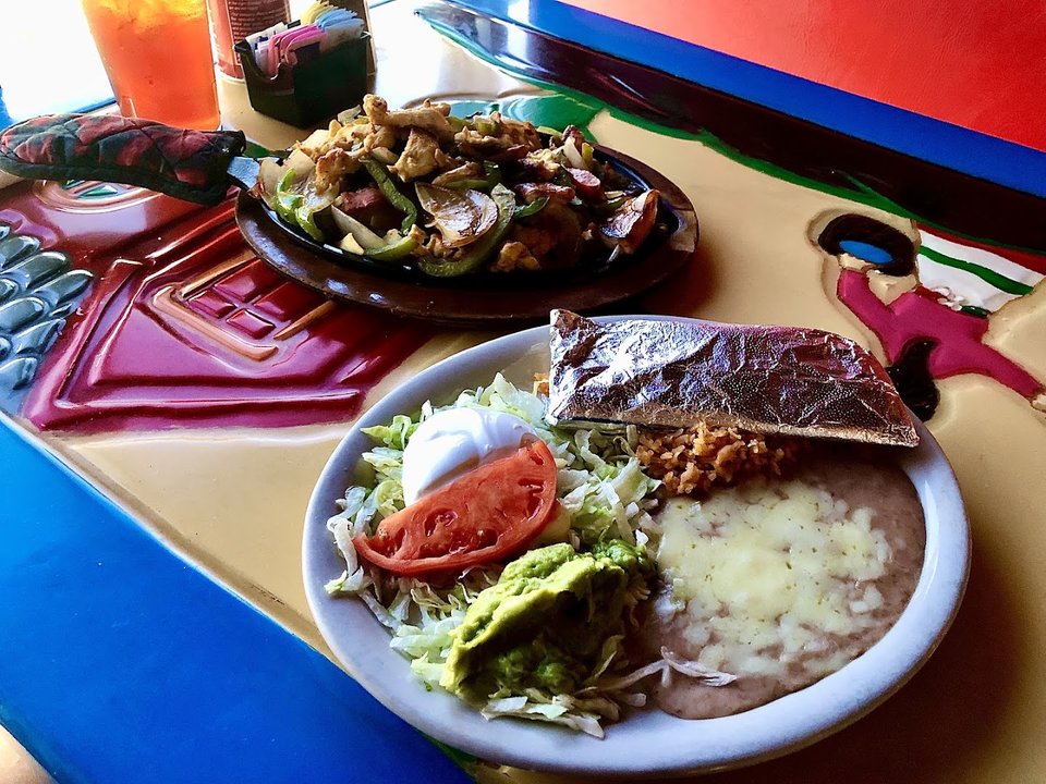 Casual dining space with Mexican restaurant atmosphere.